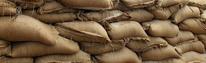 Close-up photo of sandbags, illustrating their texture and utility in flood protection and construction.